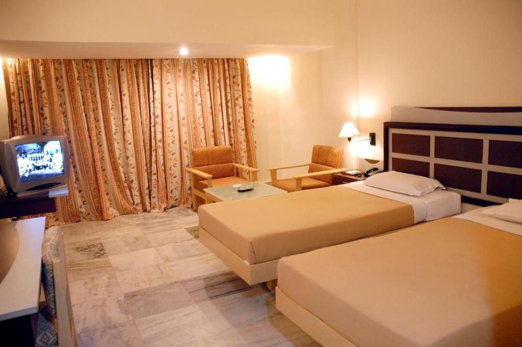 فندق فندق أبو ساروفار بورتيكو - تشيناي الغرفة الصورة
